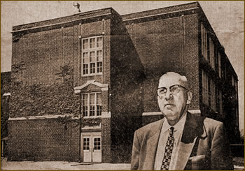 Mr. Mountz in front of school